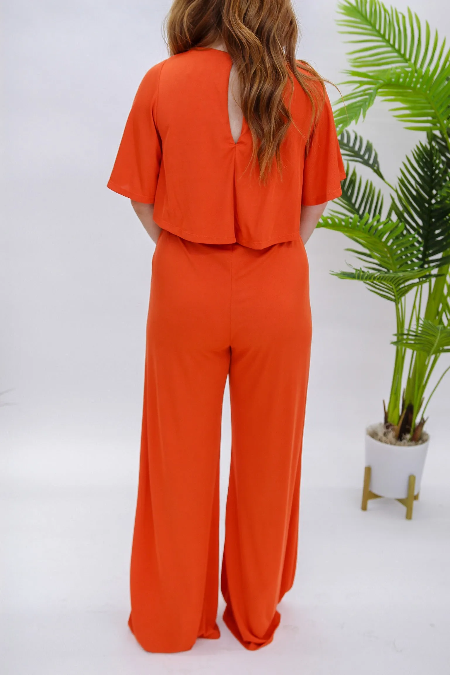 Draw You In Cut Out Jumpsuit- Rust